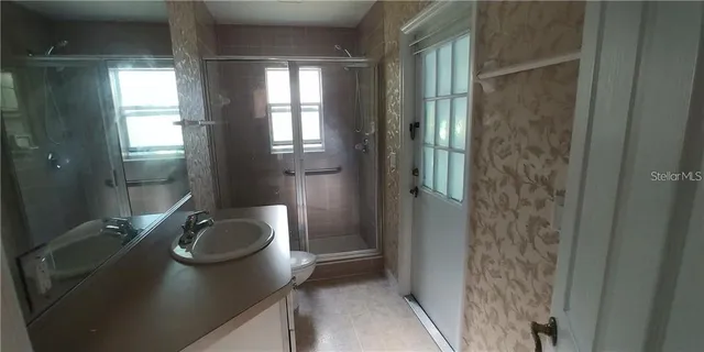 a view of storage and utility room