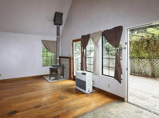 a kitchen with a stove a sink and a refrigerator