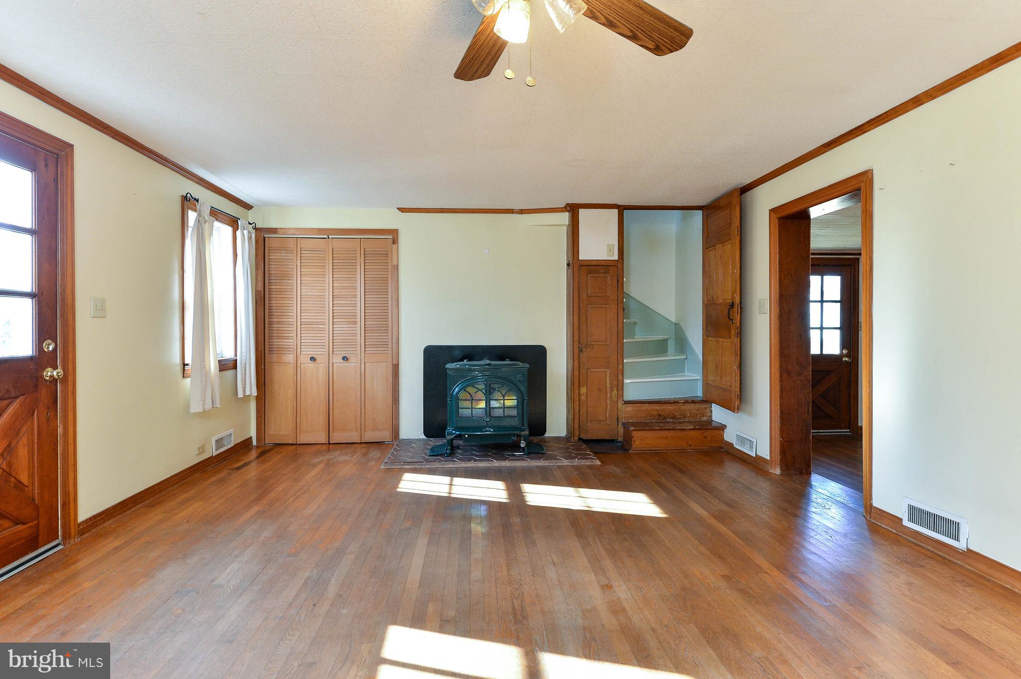 217 Little New York Road Rising Sun, MD 21911 - Photo 9 of 65 Living room with wood stove