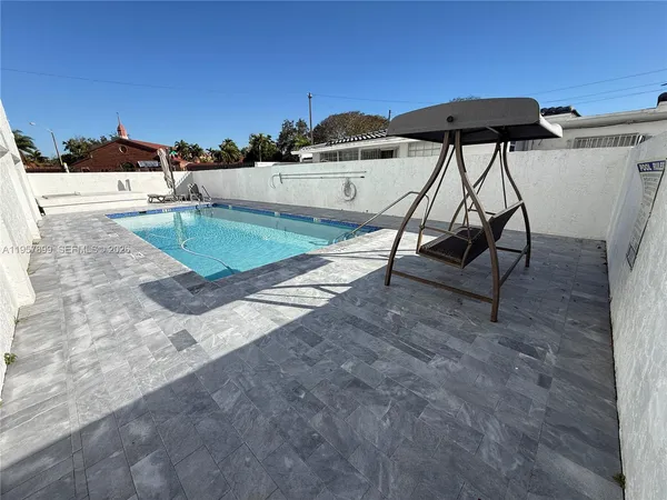 a view of a terrace with chairs
