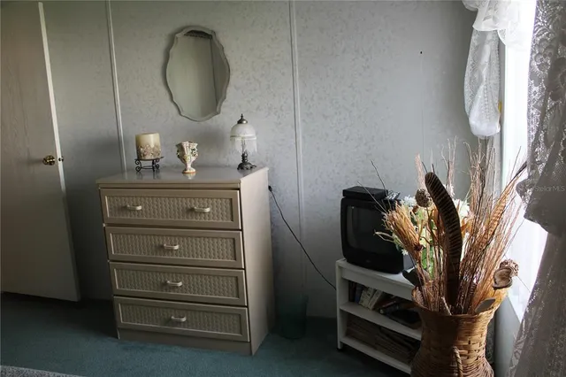 a view of a livingroom with furniture