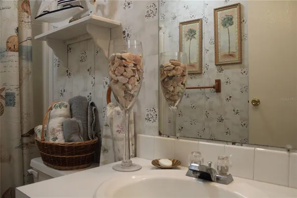 a bathroom with a tub and shower