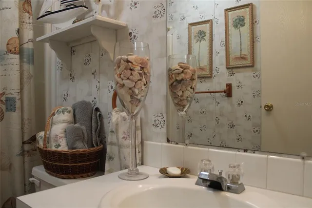 a bathroom with a tub and shower