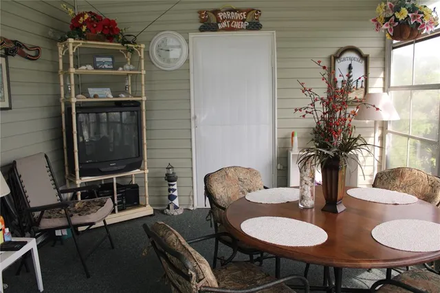 a view of a dining room with furniture