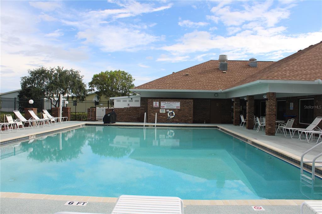 8314 Nancy Lane Ellenton, FL 34222 - Photo 25 of 34 a view of a house with pool table and chairs