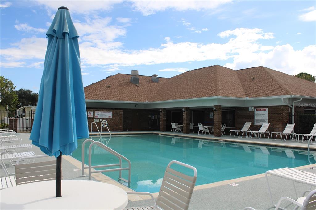 8314 Nancy Lane Ellenton, FL 34222 - Photo 26 of 34 a front view of a house with a garden and lake view