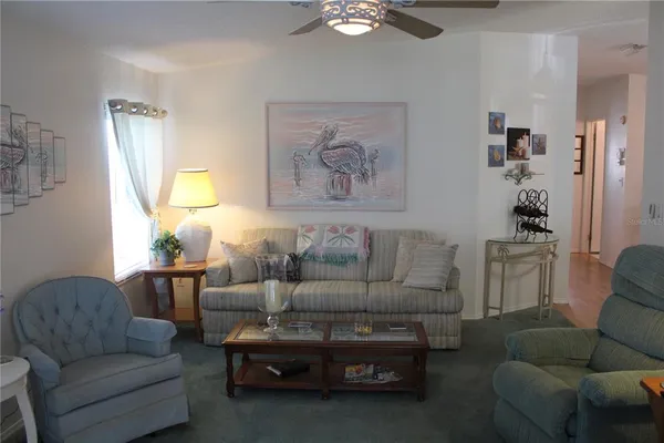 a living room with furniture and a couch