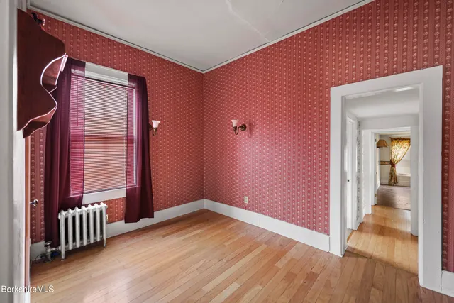 wooden floor and window in a room