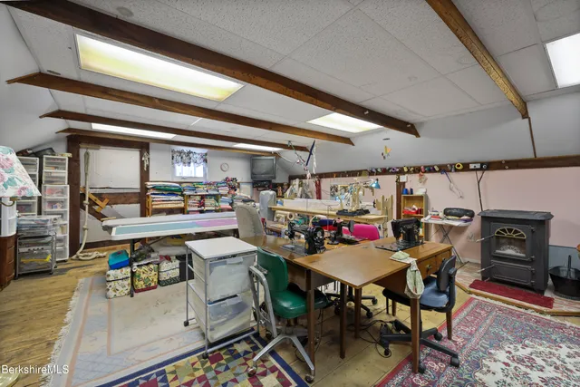a view of a play room with furniture