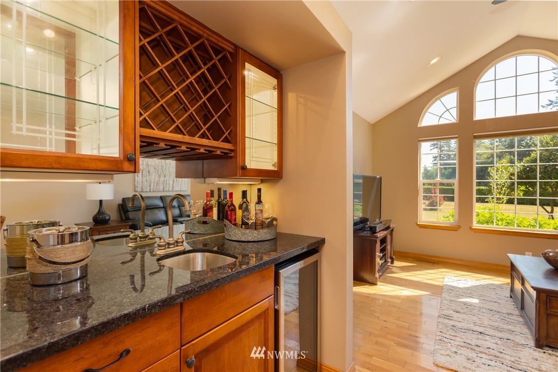 8949 Delta Line Road Custer, WA 98240 - Photo 13 of 39 a kitchen with a sink and a stove next to a window