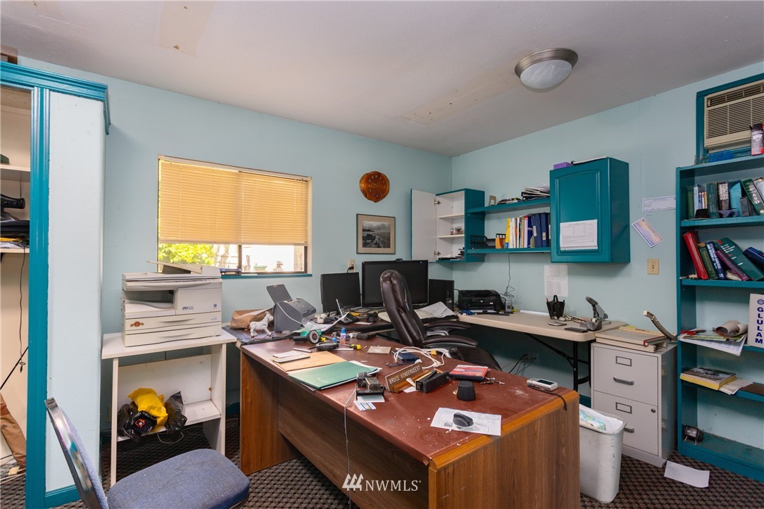 8949 Delta Line Road Custer, WA 98240 - Photo 16 of 39 a view of a workspace with furniture and a window