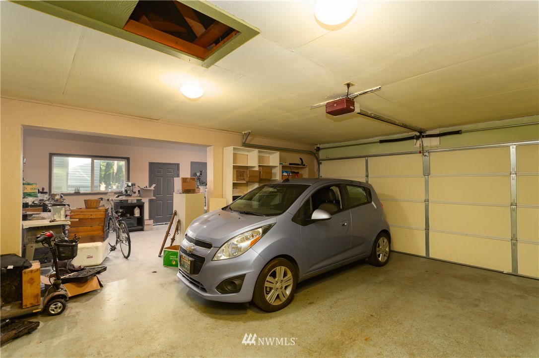 8949 Delta Line Road Custer, WA 98240 - Photo 18 of 39 a car parked in a garage