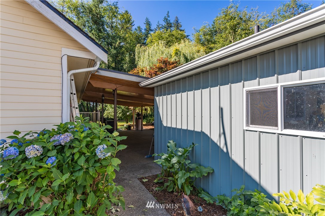 8949 Delta Line Road Custer, WA 98240 - Photo 21 of 39 a backyard of a house with lots of green space
