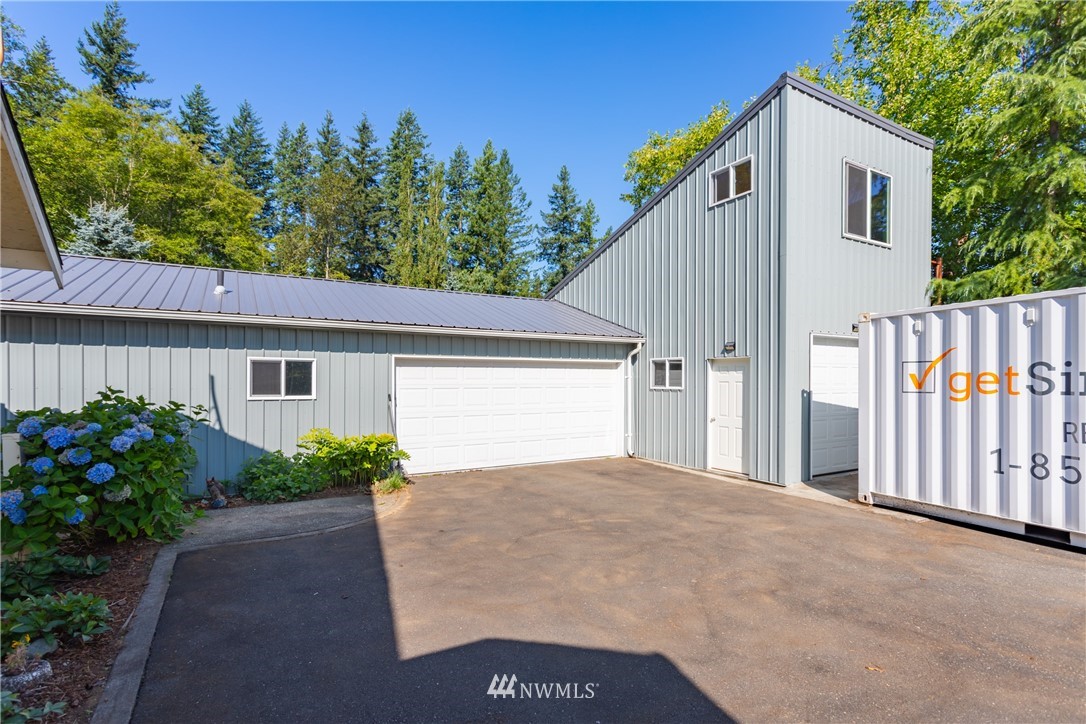 8949 Delta Line Road Custer, WA 98240 - Photo 26 of 39 a view of a house with a yard and potted plants