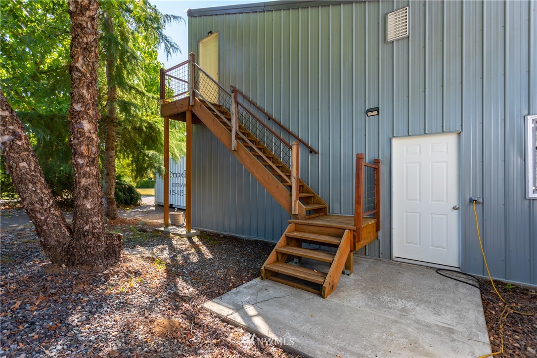 8949 Delta Line Road Custer, WA 98240 - Photo 27 of 39 a view of stairs and yard with wooden fence