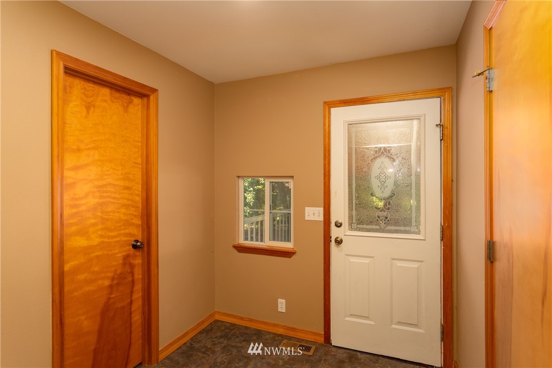 8949 Delta Line Road Custer, WA 98240 - Photo 29 of 39 a view of a small space with wooden floor and a window