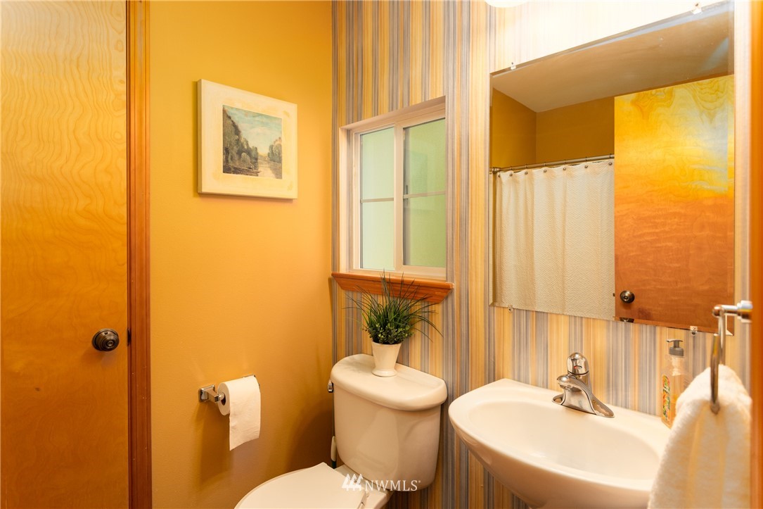 8949 Delta Line Road Custer, WA 98240 - Photo 30 of 39 a bathroom with a sink and a mirror