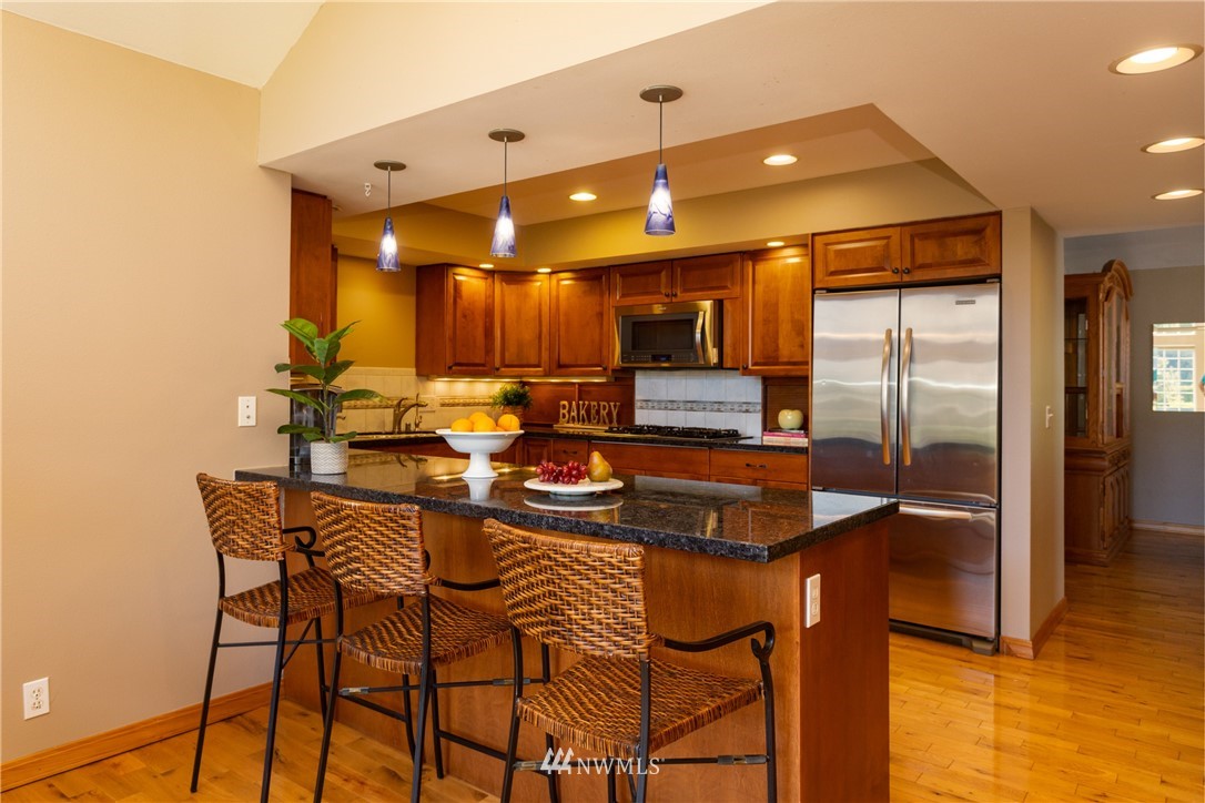 8949 Delta Line Road Custer, WA 98240 - Photo 8 of 39 a kitchen with a table and chairs in it
