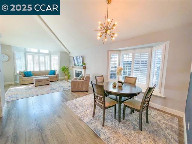 232 O'Neil Circle Hercules, CA 94547 - Photo 3 of 12 a view of a dining room with furniture window and wooden floor