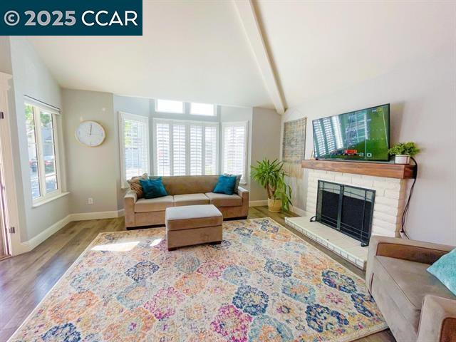 232 O'Neil Circle Hercules, CA 94547 - Photo 5 of 12 a living room with furniture and a fireplace