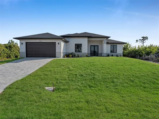 a house view with a garden space