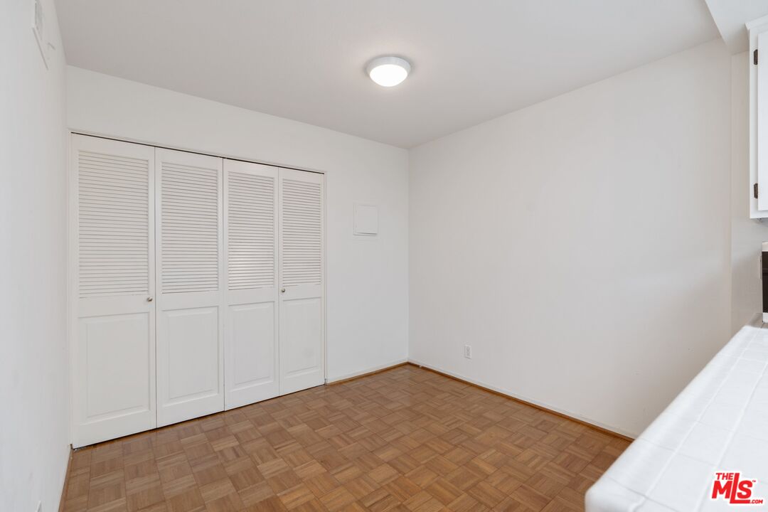 11687 Bellagio Road, Unit 5 Los Angeles, CA 90049 - Photo 13 of 31 a view of empty room