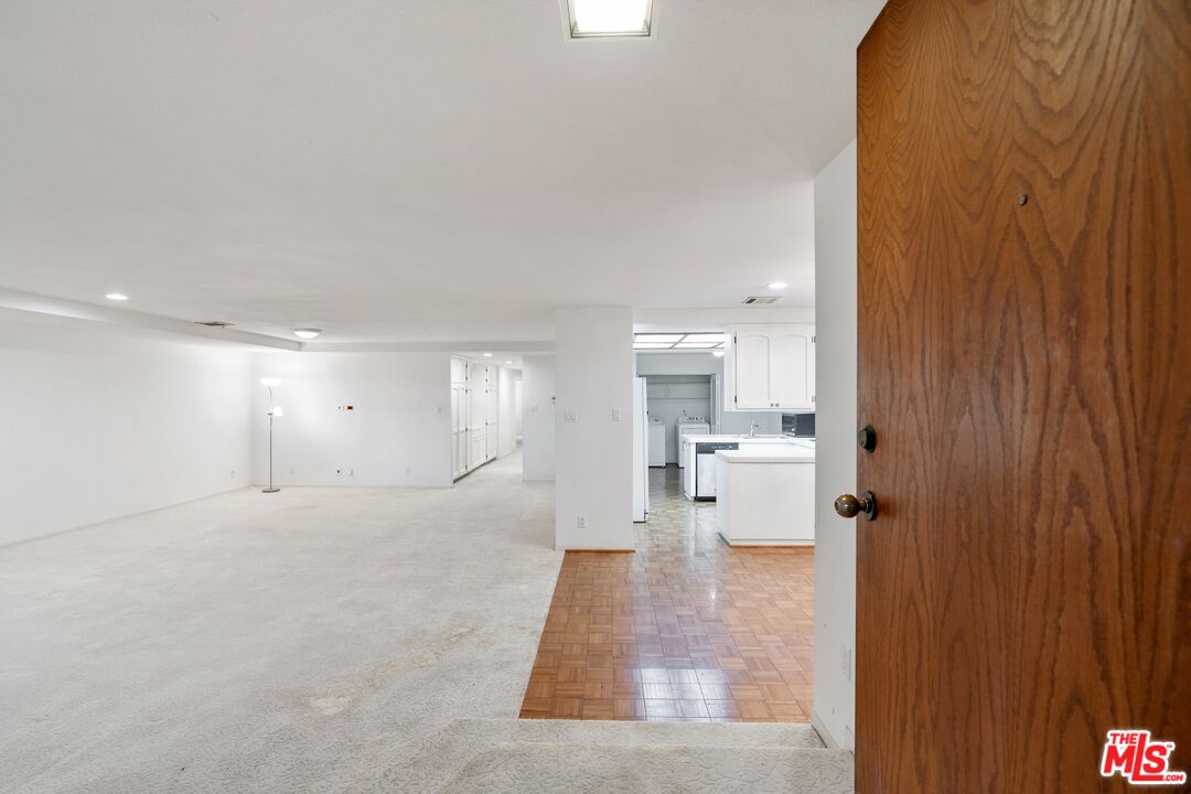 11687 Bellagio Road, Unit 5 Los Angeles, CA 90049 - Photo 5 of 31 wooden floor in a room