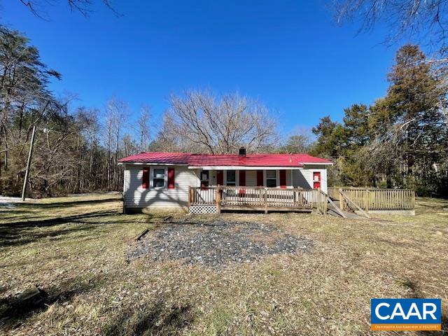 475 Liberty Road New Canton, VA 23123 - Photo 17 of 21 a view of a house with backyard and sitting area