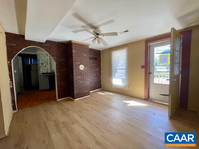 475 Liberty Road New Canton, VA 23123 - Photo 6 of 21 a view of a livingroom with wooden floor and ceiling fan