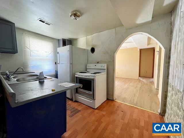 475 Liberty Road New Canton, VA 23123 - Photo 9 of 21 a kitchen with a sink stove and refrigerator
