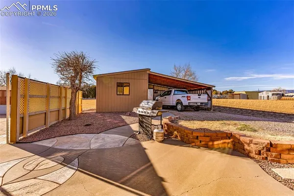a house view with a outdoor space