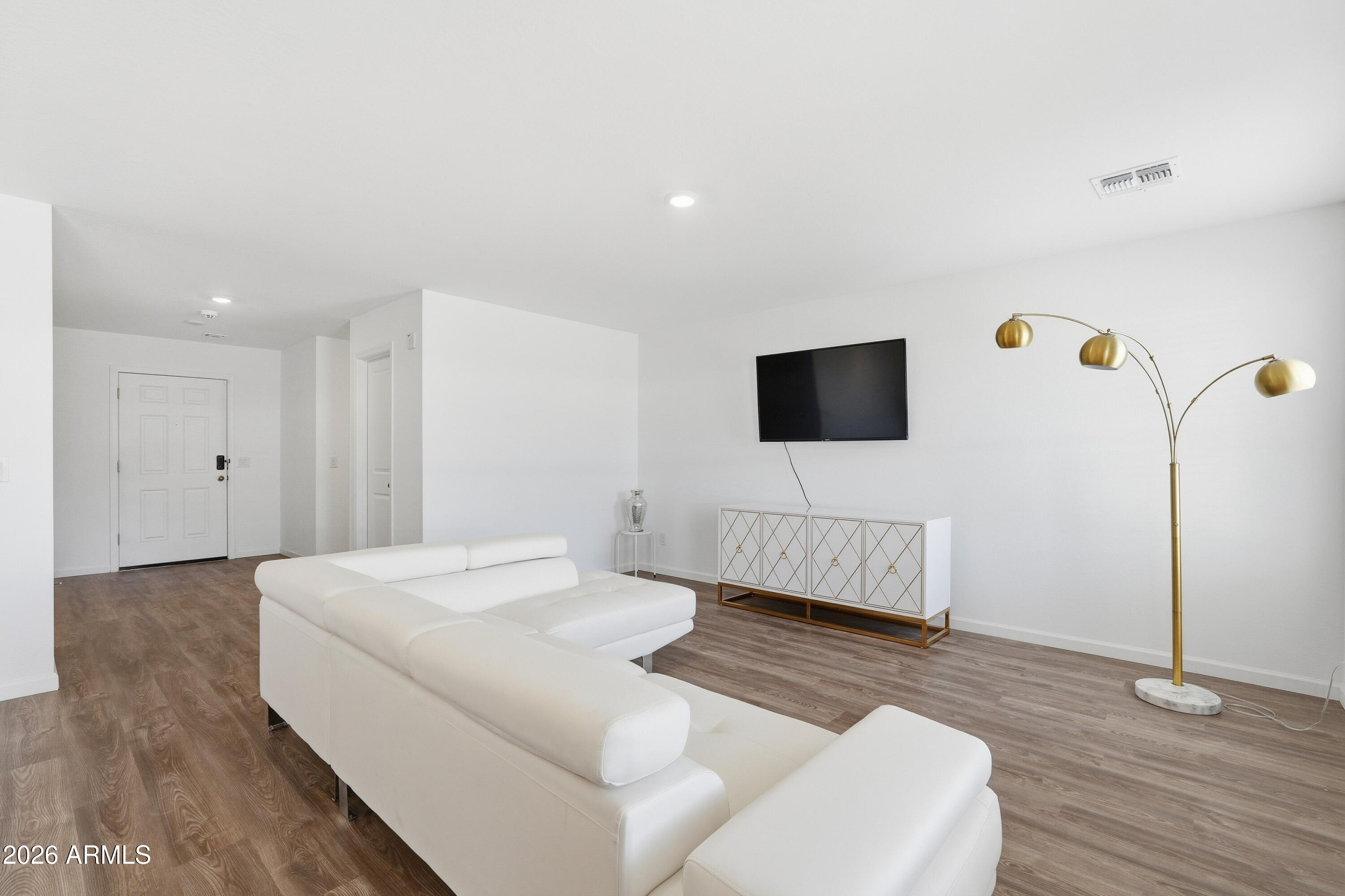 15610 South Moon Valley Road Arizona City, AZ 85123 - Photo 7 of 36 a bedroom with a bed and a flat screen tv