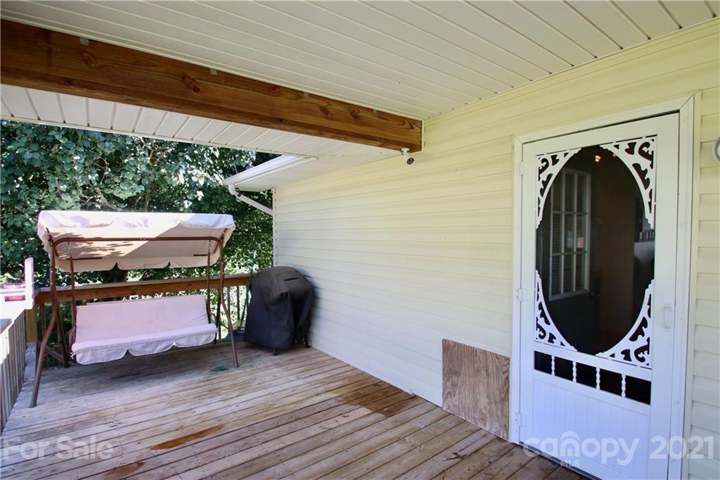 49 Sovereign Circle Clyde, NC 28721 - Photo 4 of 23 a view of entryway with wooden floor