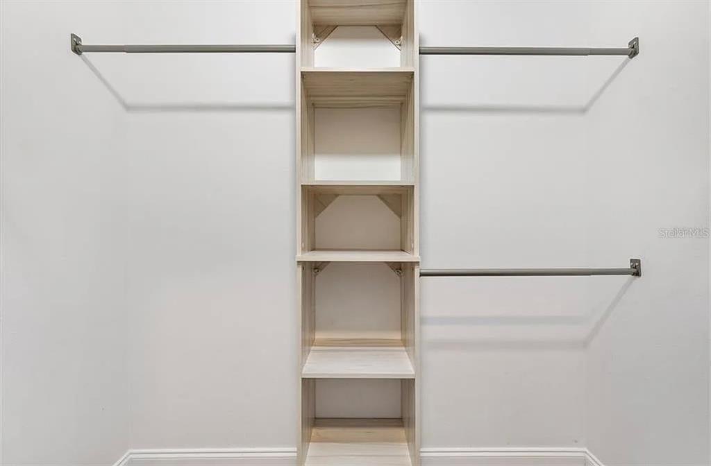 11735 Southeast 174th Loop Summerfield, FL 34491 - Photo 16 of 19 a view of an empty walk in closet