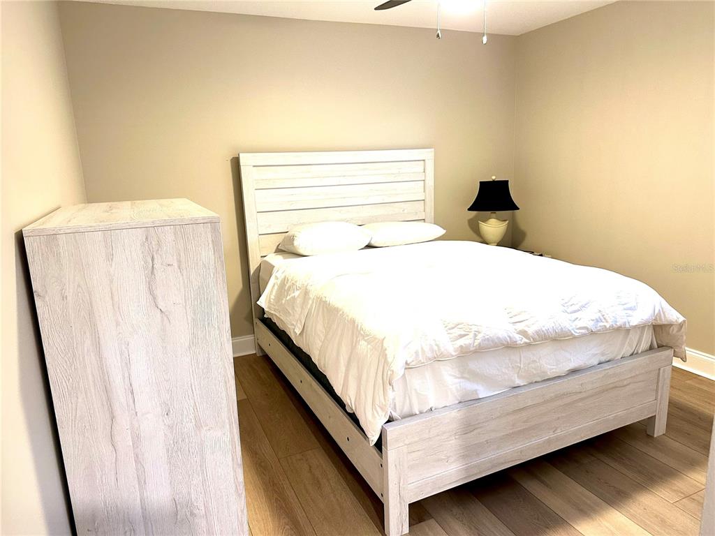 11735 Southeast 174th Loop Summerfield, FL 34491 - Photo 17 of 19 a bedroom with a bed and a window