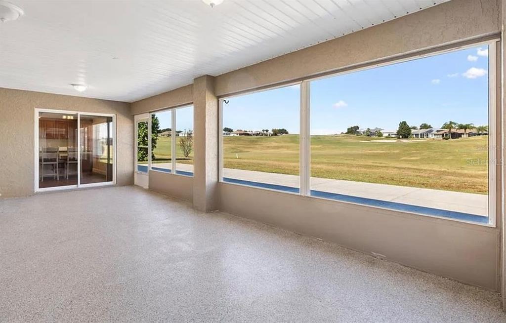11735 Southeast 174th Loop Summerfield, FL 34491 - Photo 4 of 19 a view of a room next to a large window