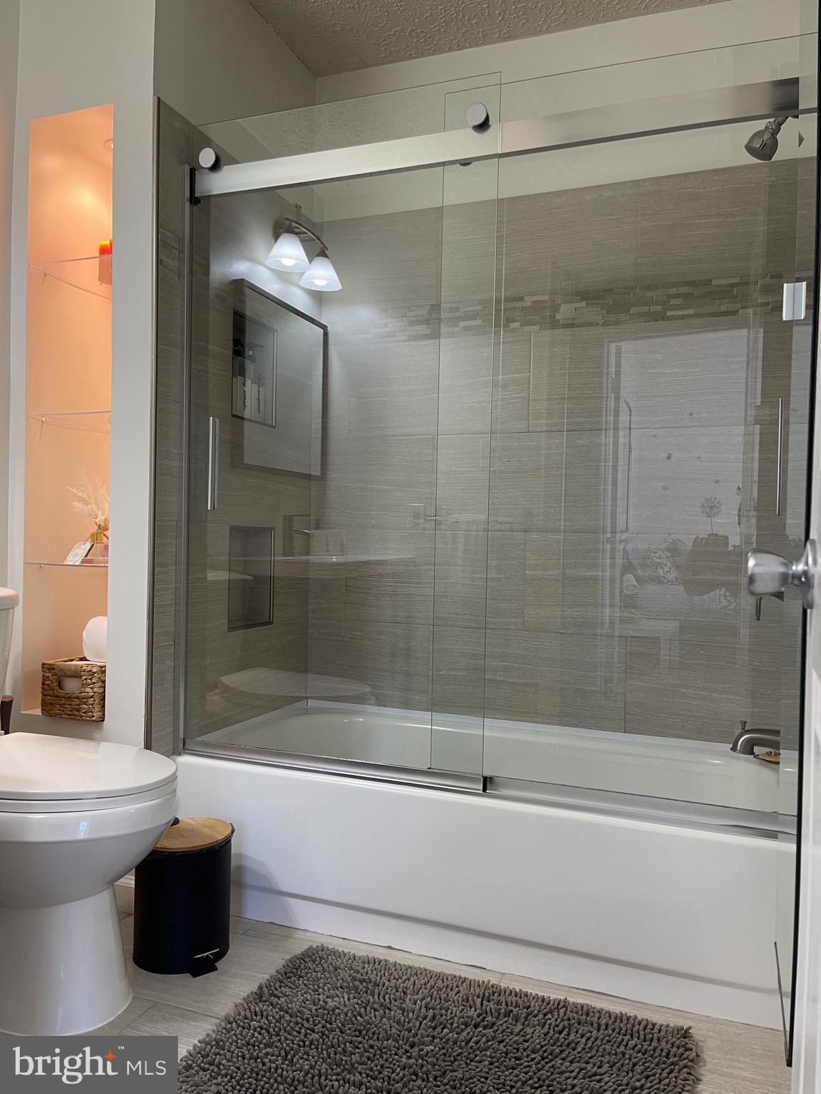 2960 McGee Way Olney, MD 20832 - Photo 18 of 25 a bathroom with a shower and a toilet