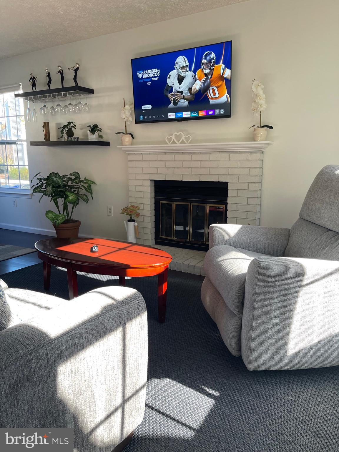 2960 McGee Way Olney, MD 20832 - Photo 3 of 25 a bedroom with a bed a couch and painting on the wall