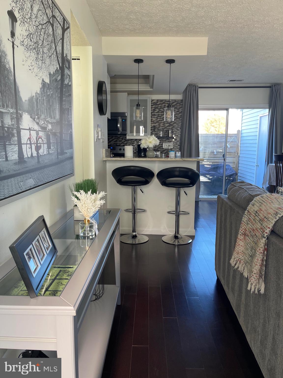 2960 McGee Way Olney, MD 20832 - Photo 5 of 25 a living room with furniture and wooden floor
