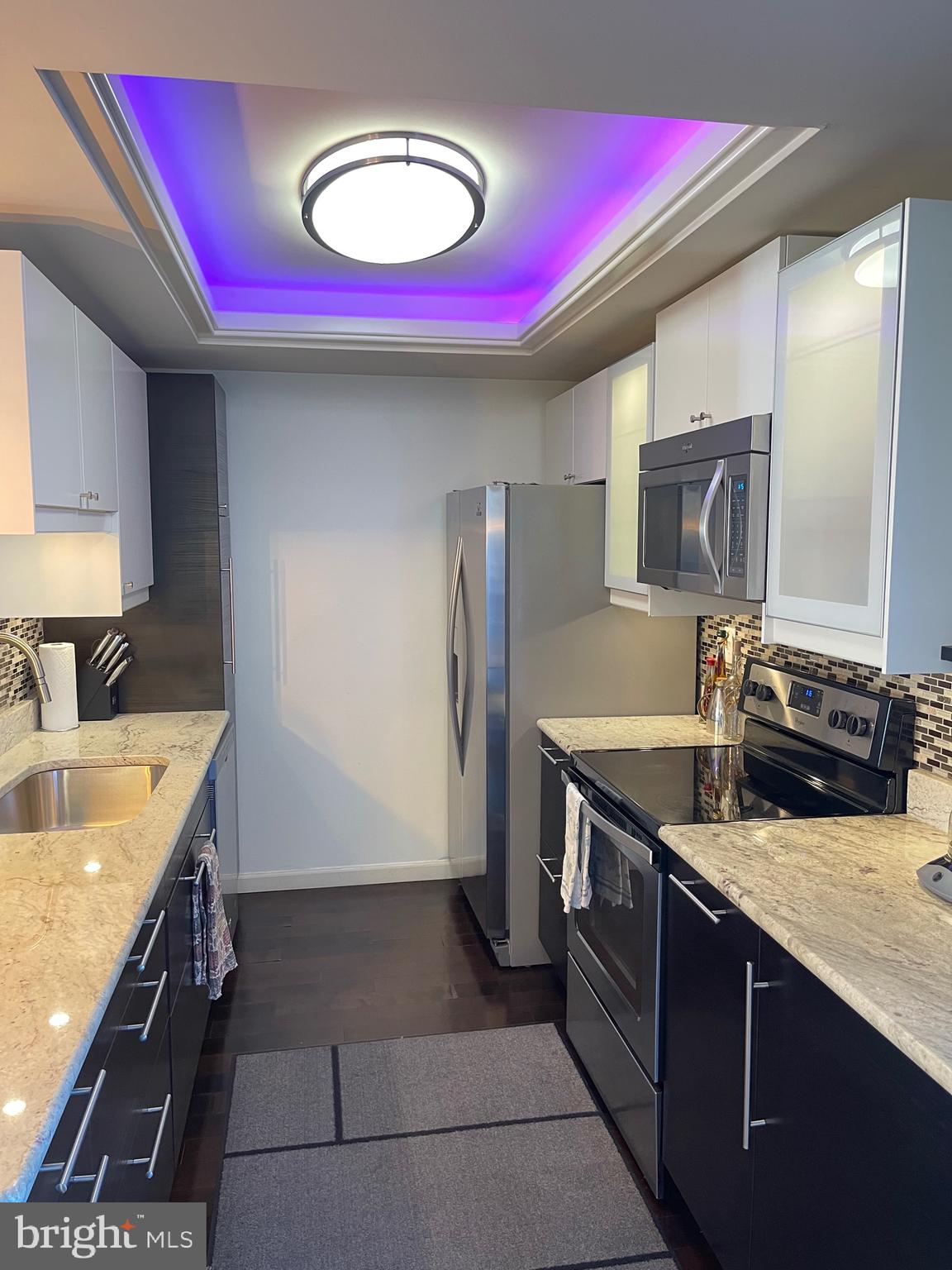 2960 McGee Way Olney, MD 20832 - Photo 8 of 25 a kitchen with stainless steel appliances granite countertop a sink stove and cabinets