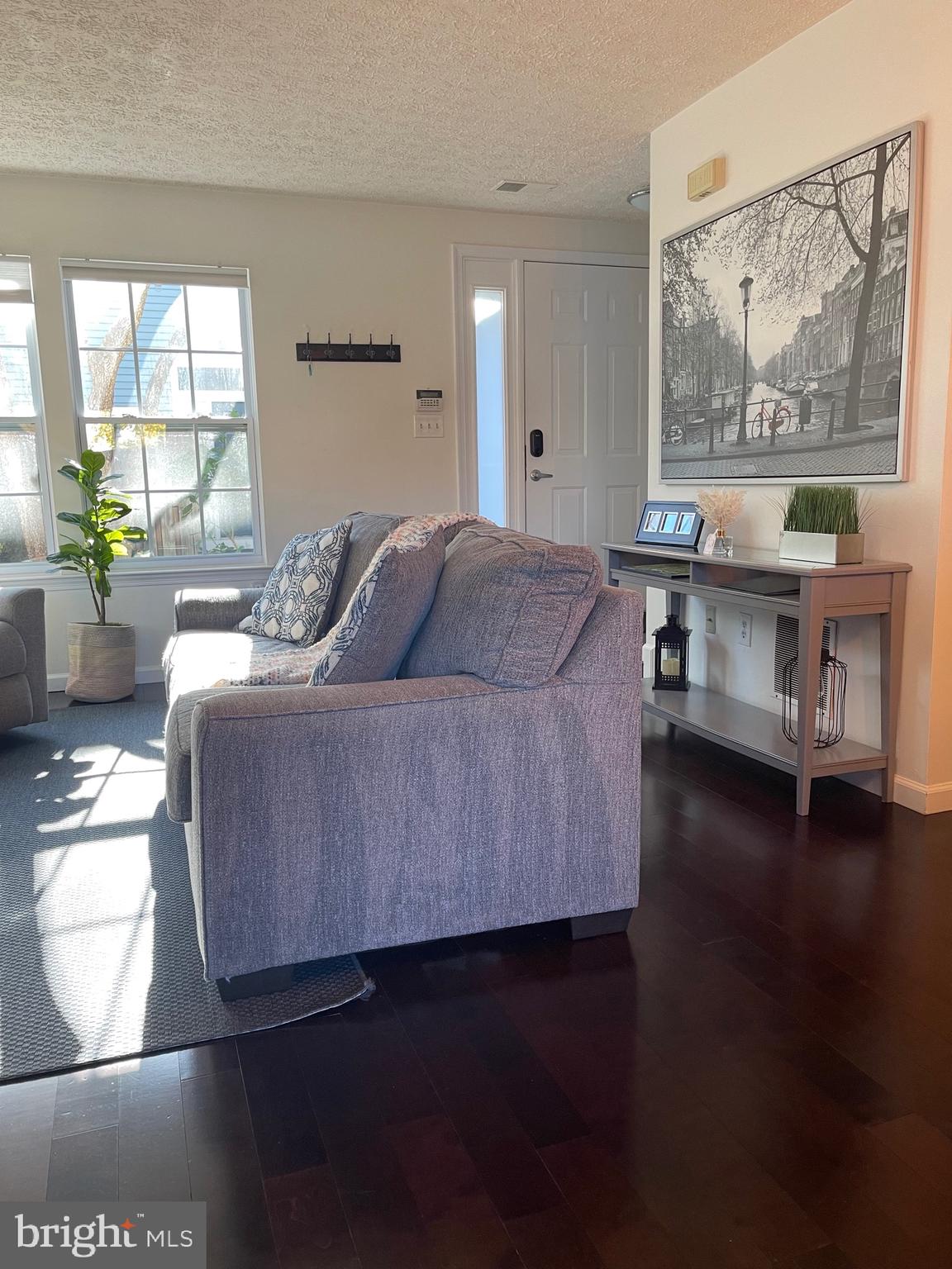 2960 McGee Way Olney, MD 20832 - Photo 10 of 25 a living room with furniture and wooden floor