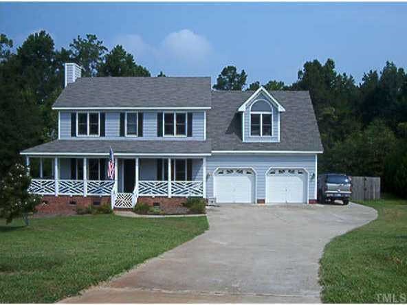 501 Trunecek Circle Raleigh, NC 27603 - Photo 1 of 1 a front view of a house with a garden and porch