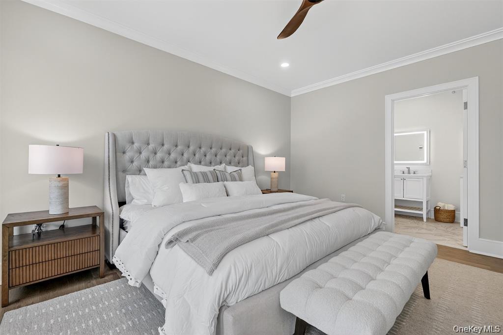 1822 Soundview Court Yorktown Heights, NY 10598 - Photo 23 of 39 a bedroom with a bed and a lamp