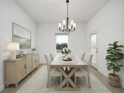 a view of kitchen with furniture and wooden floor
