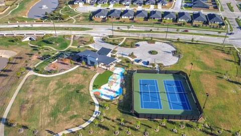 a view of a swimming pool with a terrace