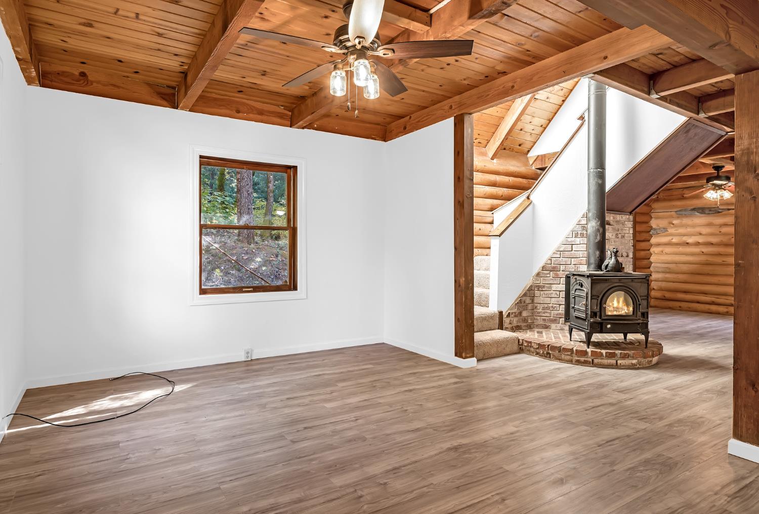 1610 Swansboro Road Placerville, CA 95667 - Photo 18 of 50 a view of empty room with wooden floor and fan