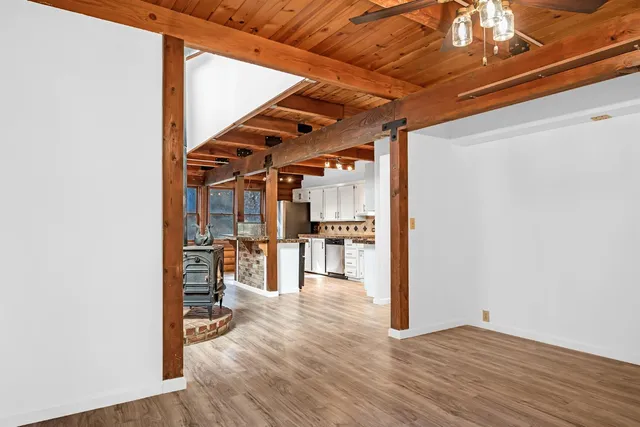 a view of a livingroom with wooden floor
