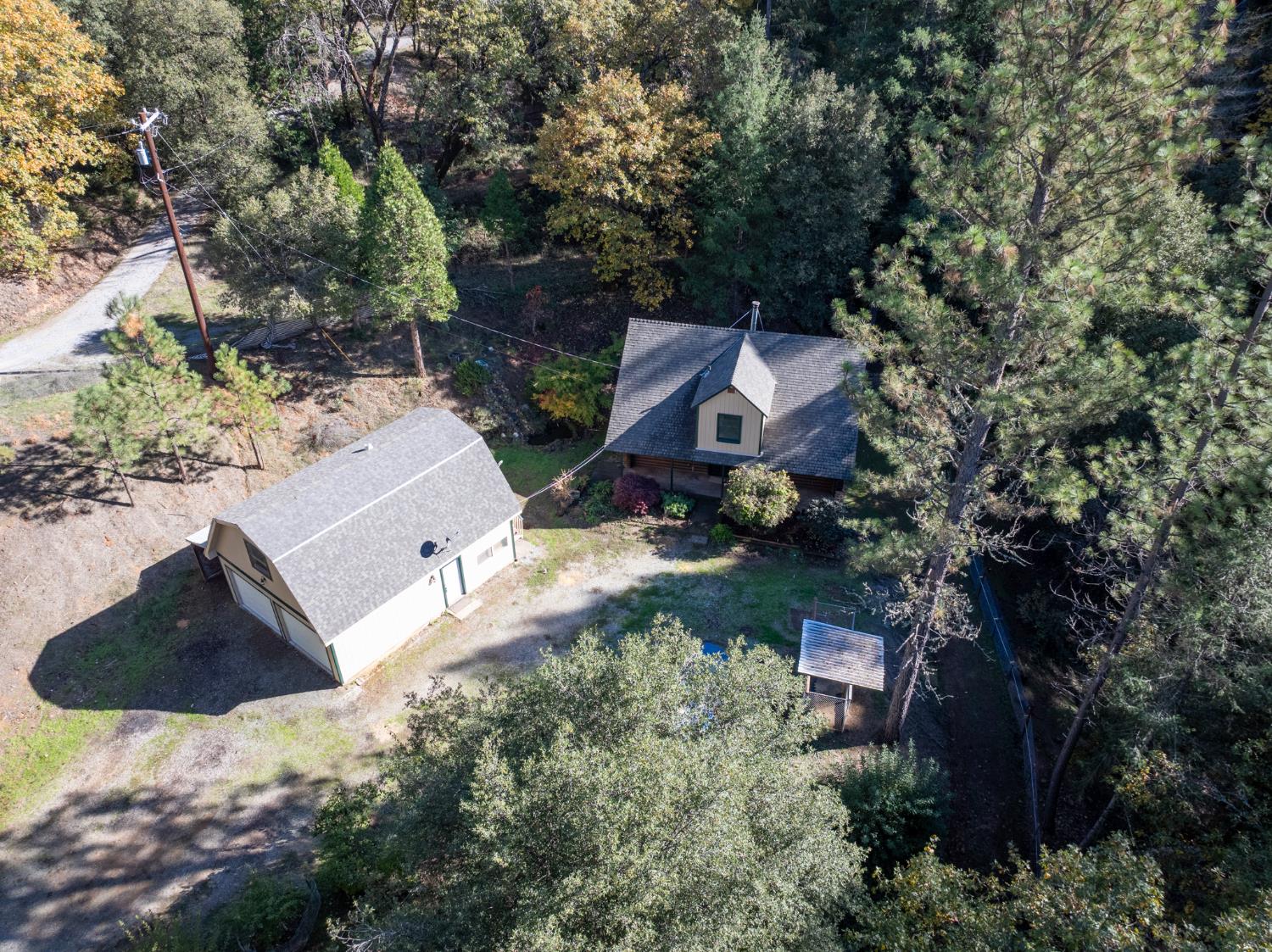 1610 Swansboro Road Placerville, CA 95667 - Photo 47 of 50 an aerial view of a house with a yard