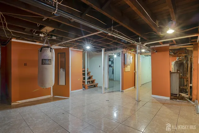 a view of an empty room with wooden walls