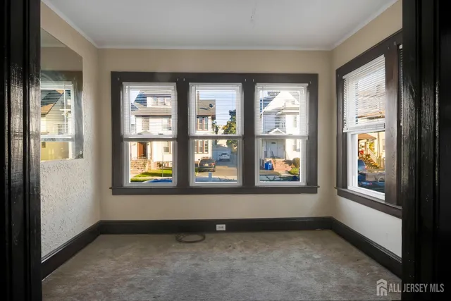 an empty room that has a window